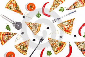 Slices of pizza, ingredients and cutlery on a white background. Top view