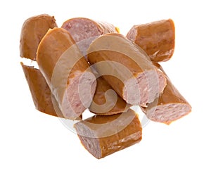Slices of Polska kielbasa on a white background photo
