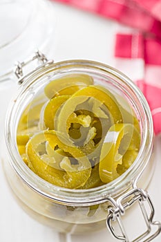 Slices of preserved Jalapeno pepper.