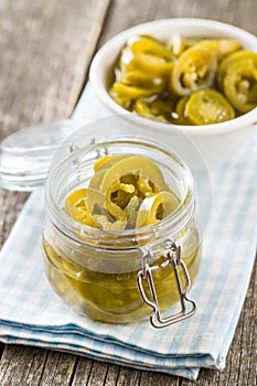 Slices of preserved Jalapeno pepper.