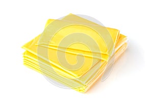 Slices of processed cheese on a white background.