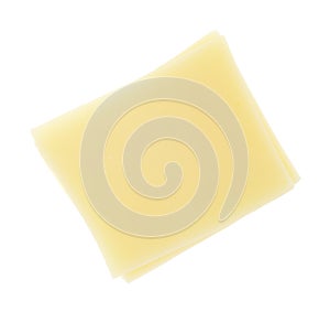 Slices of provolone cheese on white background photo