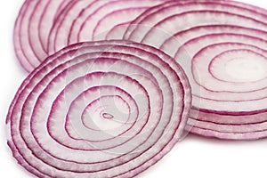 Slices of purple onion in a top view