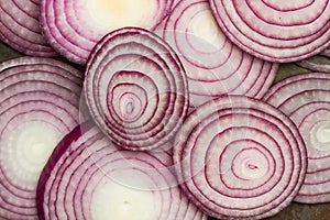 Slices of purple onion in a top view