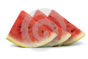 Slices of red watermelon isolated on white background close up