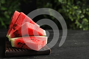 Slices of ripe juicy watermelon on table, closeup. Space for text