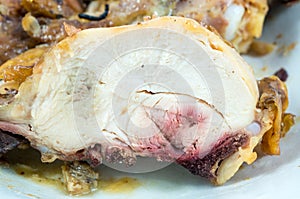 Slices of roasted chicken