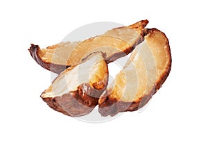 Slices of roasted potatoes isolated on a white background