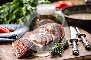 Slices of rump steak served rustic style with a mushroom sauce