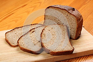 Slices of rye bread on a cutting board