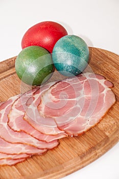 Slices of smoked ham with easter egg