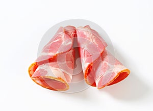 Slices of smoked pork - rolled up