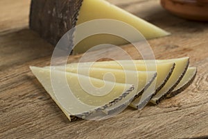 Slices of Spanish Manchego cheese