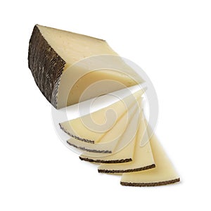 Slices of Spanish Manchego cheese photo