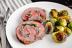 Stuffed Flank Steak with Prosciutto and Mushrooms Dinner photo