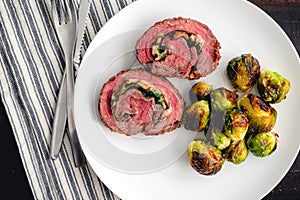Stuffed Flank Steak with Prosciutto and Mushrooms Dinner photo