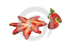 Slices of strawberries and whole fruits