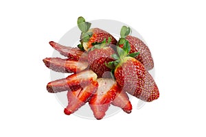 Slices of strawberries and whole fruits