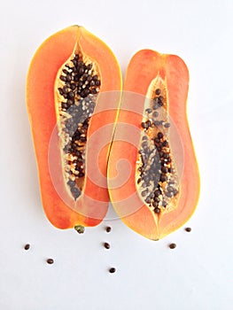 Slices of sweet papaya on white