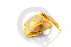 Slices of sweet ripe dried mango on white background