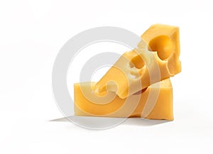 Slices of swiss cheese on white background