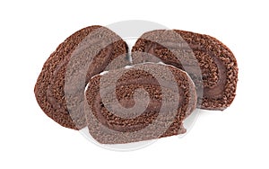 Slices of tasty chocolate cake roll with cream on white background, top view