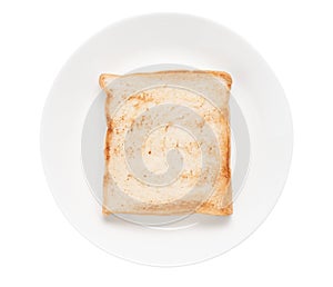 Slices toast bread in dish on white background