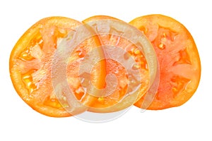 slices of tomato isolated on a white background top view