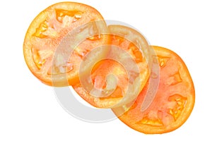 slices of tomato isolated on a white background top view