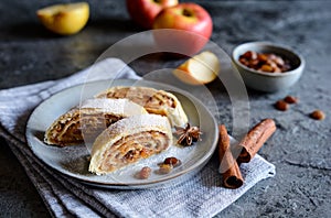 Traditional apple roulade with raisins and cinnamon