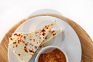 Slices of traditional finnish squeaky cheese served with cloudberry jam.