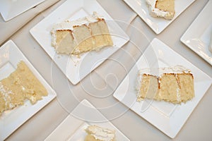 Slices of yellow wedding cake.