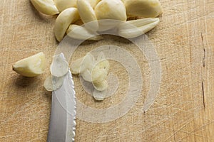 Slicing Fresh Pealed Garlic Cloves