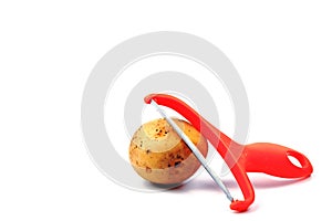 Slicing potatoes. Potato peeler. on a white isolated background. Slicer. Professional