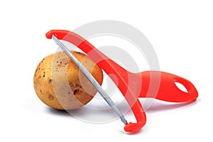 Slicing potatoes. Potato peeler. on a white isolated background. Slicer. Professional