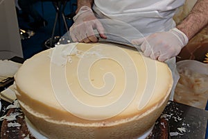 Slicing Raspadura: Italian Cow& x27;s Milk Cheese photo