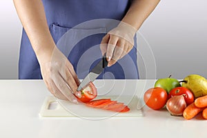 Slicing tomatoes 2