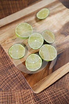 Slicing these vibrant limes in half, ready to add a burst of tangy flavor to my dishes