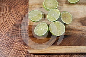 Slicing these vibrant limes in half, ready to add a burst of tangy flavor to my dishes