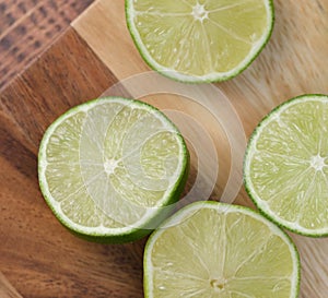 Slicing these vibrant limes in half, ready to add a burst of tangy flavor to my dishes