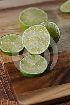 Slicing these vibrant limes in half, ready to add a burst of tangy flavor to my dishes