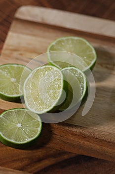 Slicing these vibrant limes in half, ready to add a burst of tangy flavor to my dishes