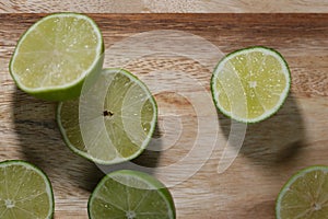 Slicing these vibrant limes in half, ready to add a burst of tangy flavor to my dishes