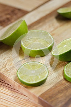 Slicing these vibrant limes in half, ready to add a burst of tangy flavor to my dishes