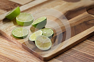 Slicing these vibrant limes in half, ready to add a burst of tangy flavor to my dishes