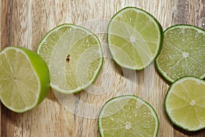 Slicing these vibrant limes in half, ready to add a burst of tangy flavor to my dishes