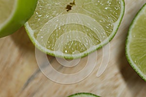 Slicing these vibrant limes in half, ready to add a burst of tangy flavor to my dishes