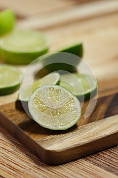 Slicing these vibrant limes in half, ready to add a burst of tangy flavor to my dishes