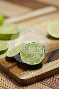 Slicing these vibrant limes in half, ready to add a burst of tangy flavor to my dishes