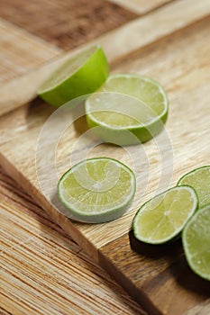 Slicing these vibrant limes in half, ready to add a burst of tangy flavor to my dishes